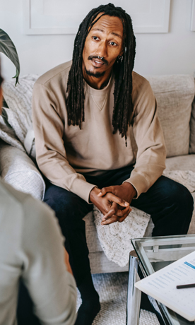 man in therapy session Redefining You Therapy, INC.